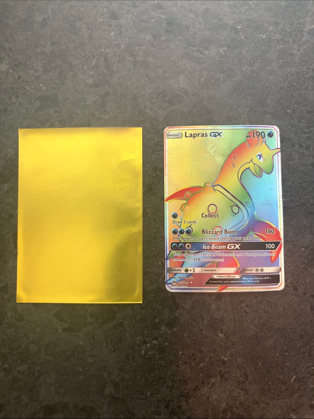 Pokemon Lapras GX Rainbow Holographic Card with Yellow Sleeve